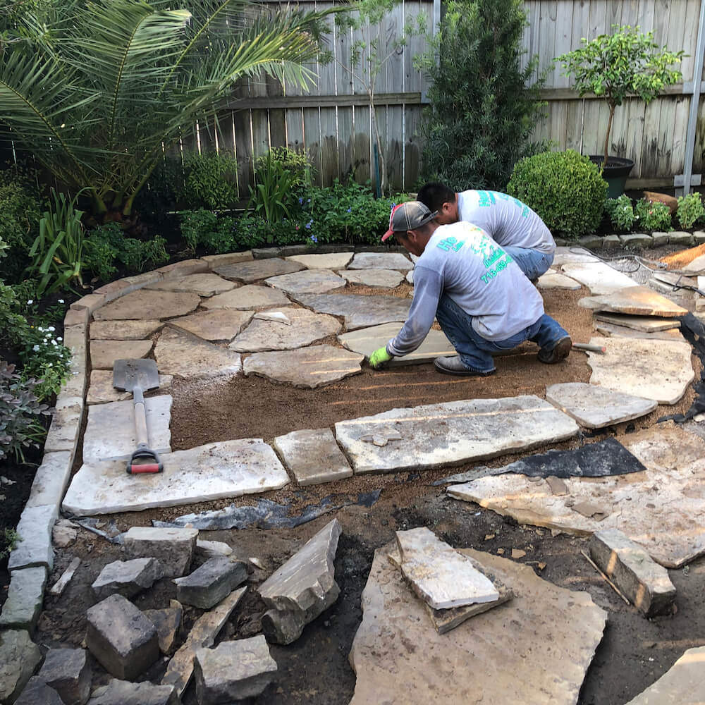 laying flagstone on concrete