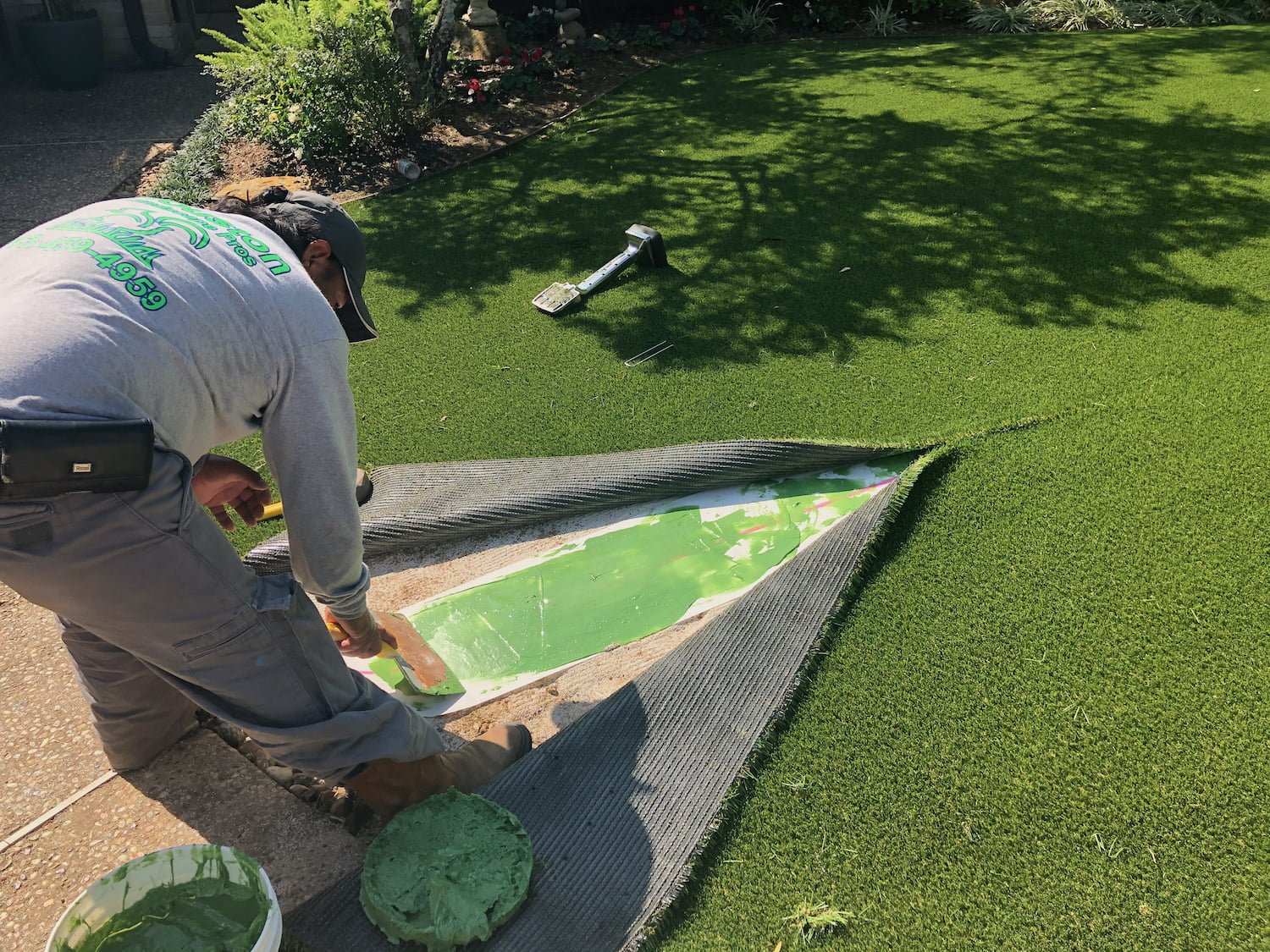 Artificial Grass landscaper installation- 77042